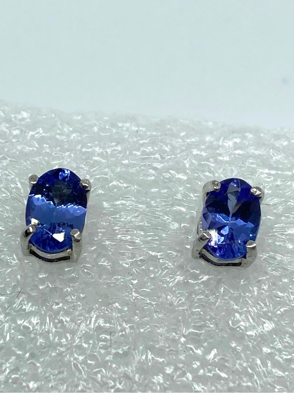 6mm x 4mm Tanzanite Sterling Silver Cut Oval Stud Earrings - Violet Blue